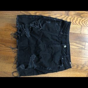 Black denim ripped mini skirt
